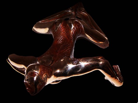Bronze brun strié facon noeuds de bois et poli 1/8.